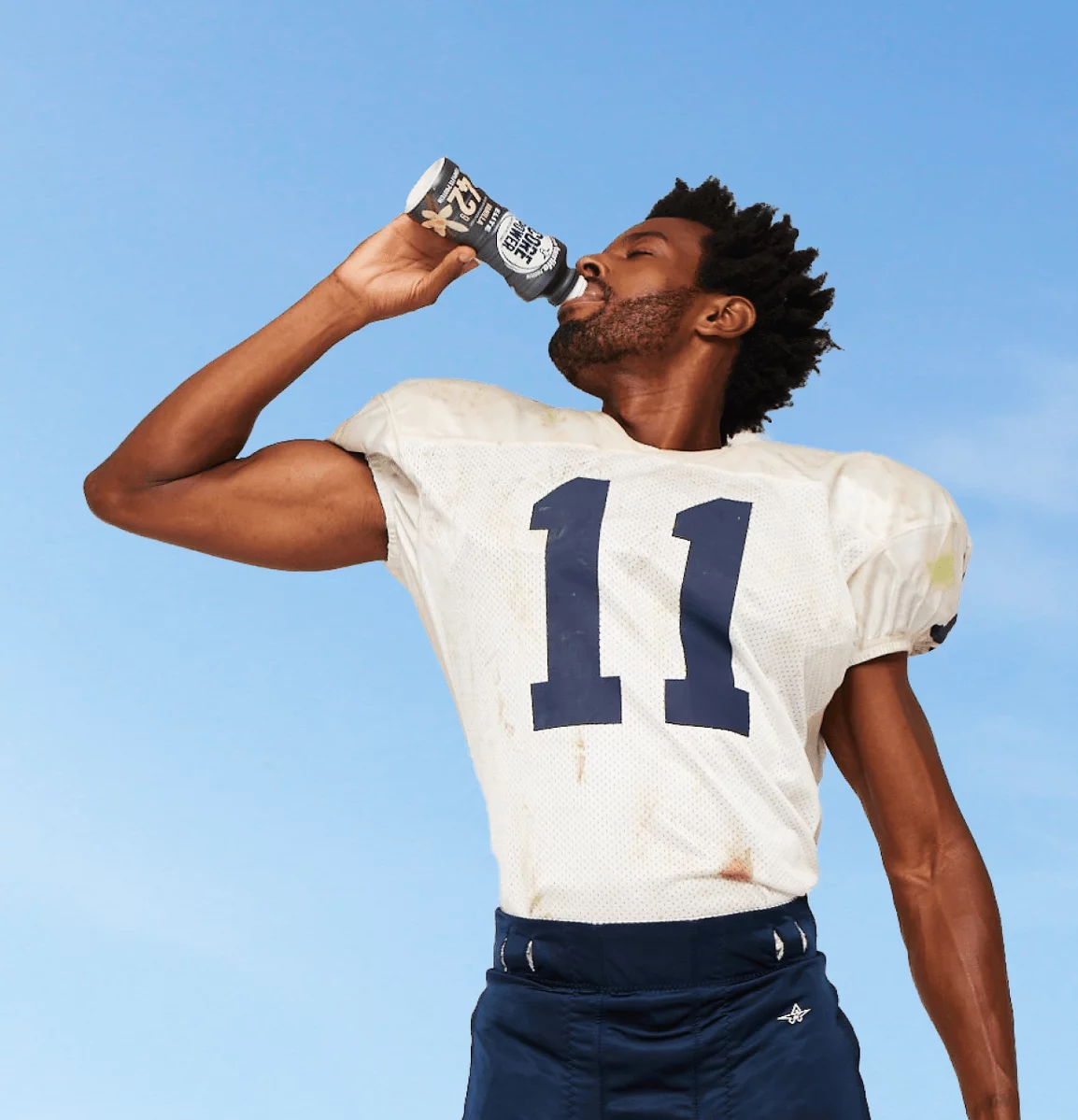 Football player drinking fairlife core power