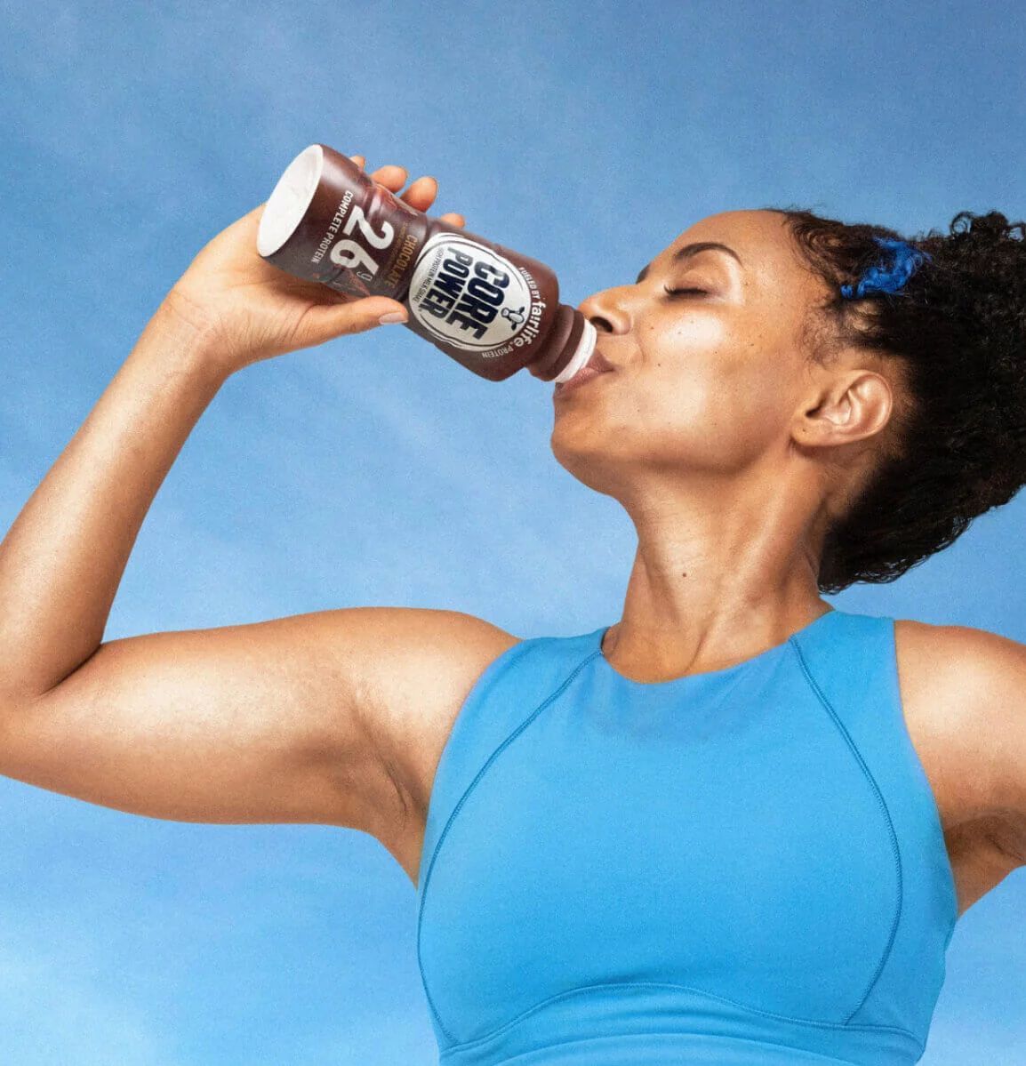 Woman drinking fairlife Core Power